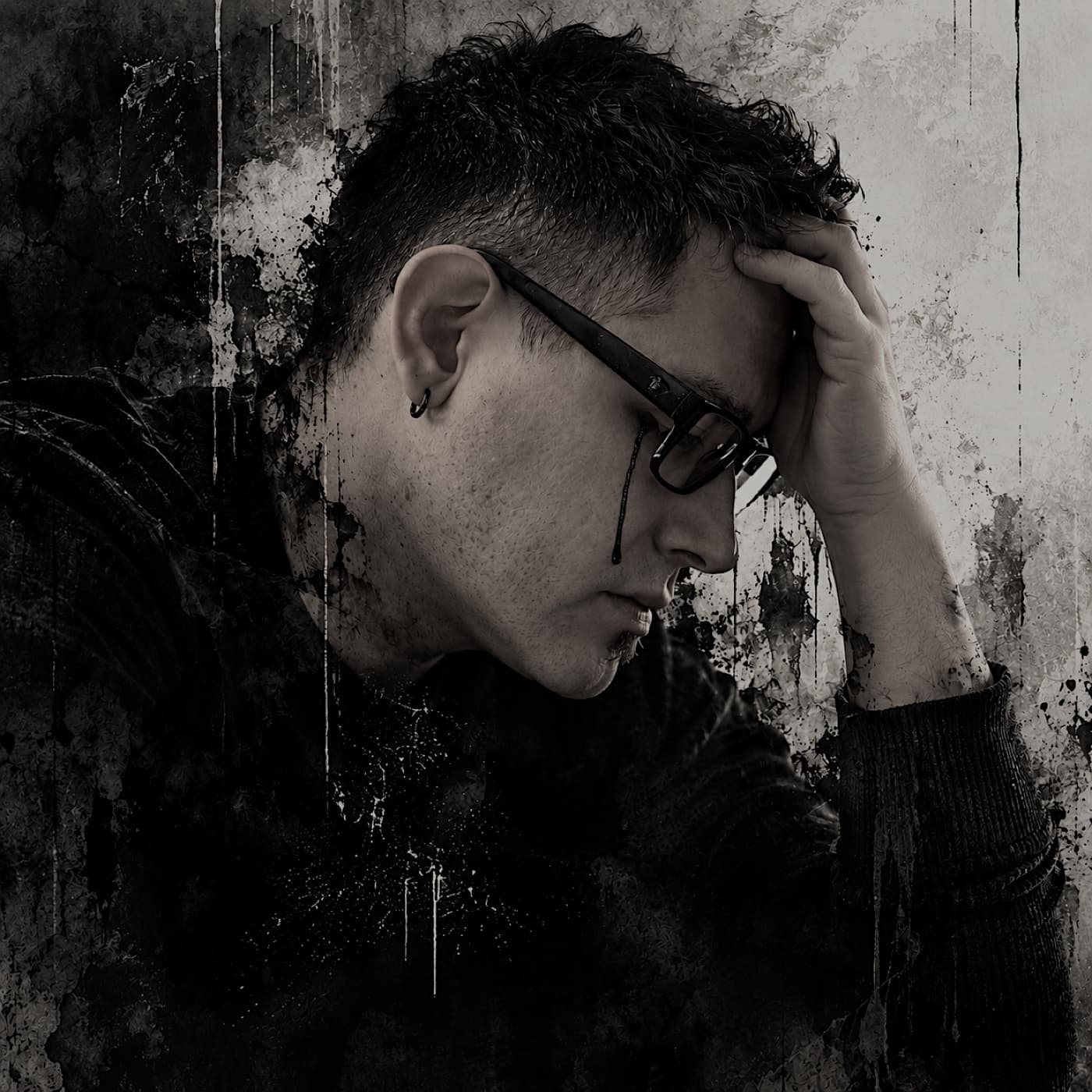 Scars cover art: a black and white portrait of the artist in profile, head bowed into his hand, a single dark tear running from beneath his glasses, the image streaked and splattered with ink
